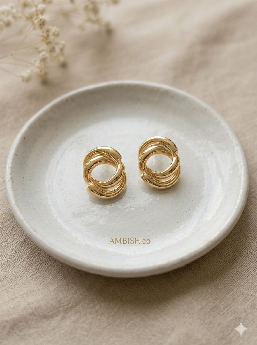 Chunky Gold Knot Hoops by aambish Jwelles